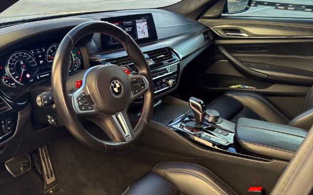 BMW M5 Competition Manhart rental in Prague — Masons